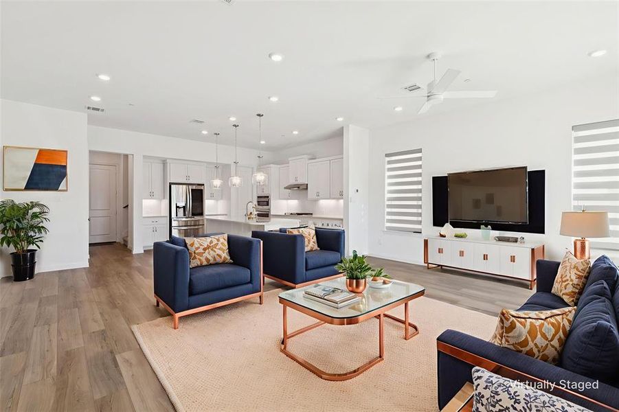 Main Living area featuring light wood-style flooring, recessed lighting, and ceiling fan Main Living area featuring light wood-style flooring, recessed lighting, and ceiling fan