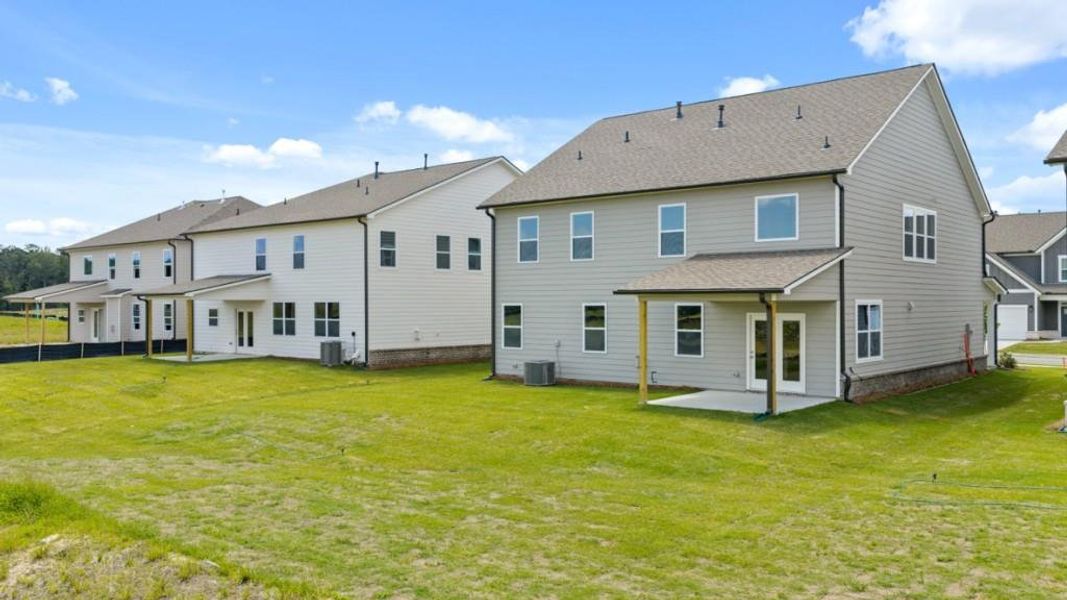 Front exterior of a new home in Hamptons at Riverwood East, Dallas, GA, highlighting curb appeal (Image 23).