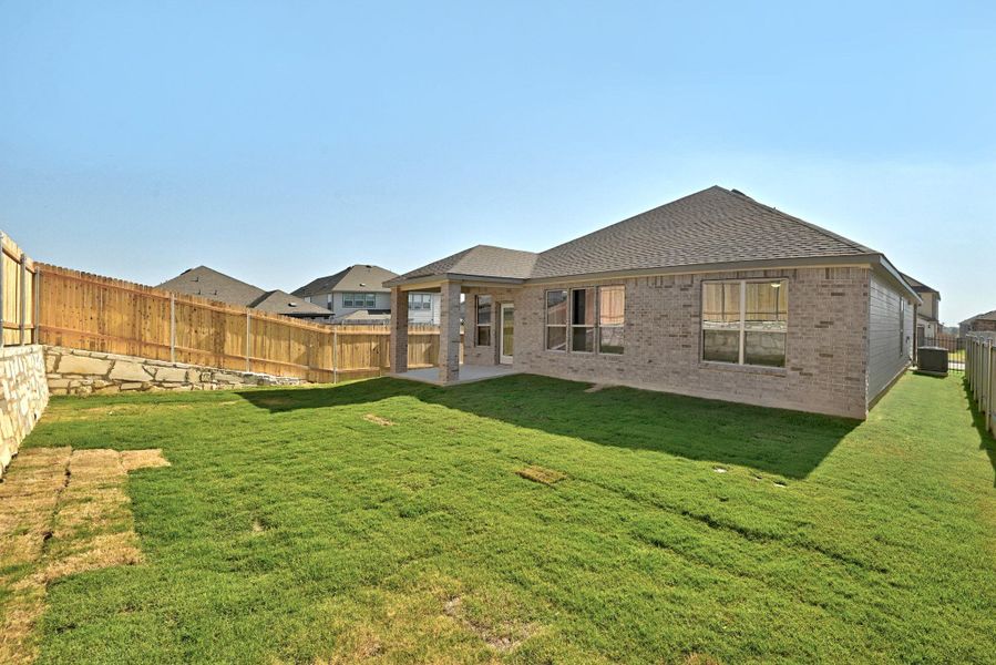Exterior details and patio area of a home in McKinney Crossing, Austin (Image 3). Exterior details and patio area of a home in McKinney Crossing, Austin (Image 3).