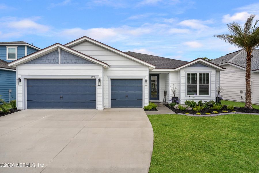 Front exterior of a new home in , Jacksonville, FL, highlighting curb appeal (Image 23).