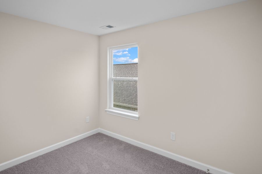 Spacious, unfurnished interior of a new home in Traditions at Carolina Forest, Myrtle Beach (Image 19).