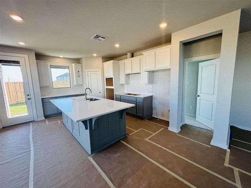 Kitchen w/ built-in appliances