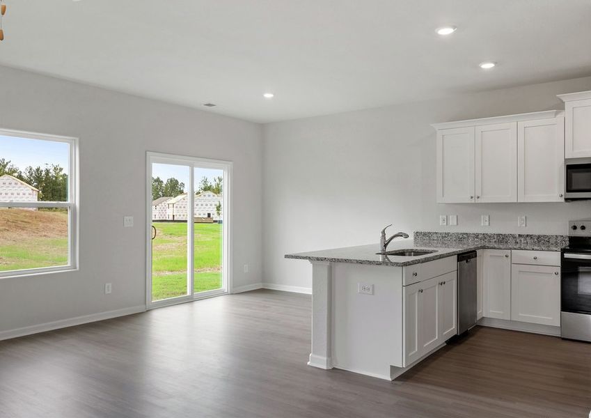 The kitchen overlooks the dining room