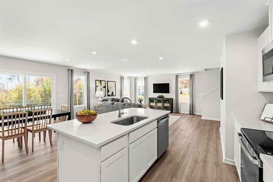 Representative furnished interior of a home built from the Woodford by Ryan Homes in Oakwood Trace, Fairburn (Image 10).