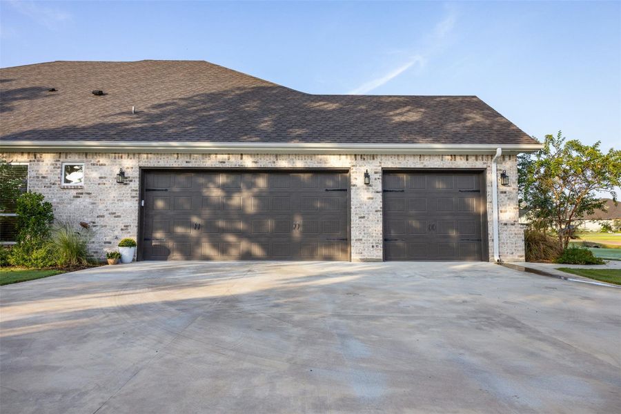Front exterior of a new home in , College Station, TX, highlighting curb appeal (Image 25).