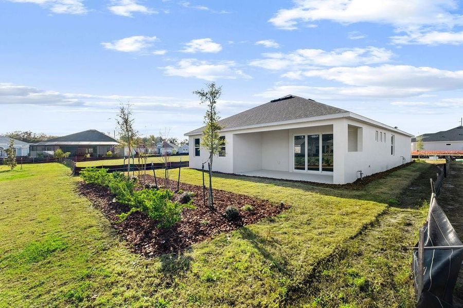Exterior details and patio area of a home in Lakes of Mount Dora, Mount Dora (Image 21).