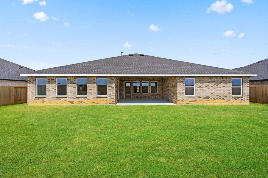 Exterior details and patio area of a home in Riverside Estates, Mont Belvieu (Image 3).