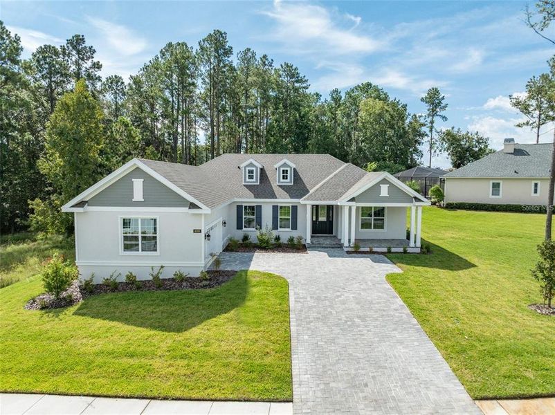 Front exterior of a new home in Southern Hills Plantation, Brooksville, FL, highlighting curb appeal (Image 22).
