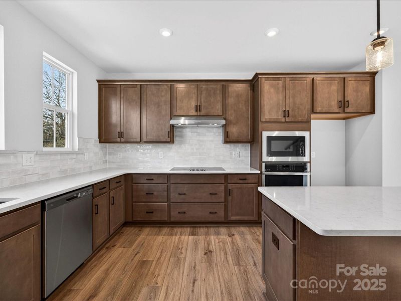 Modern Dark Stained Cabinetry.