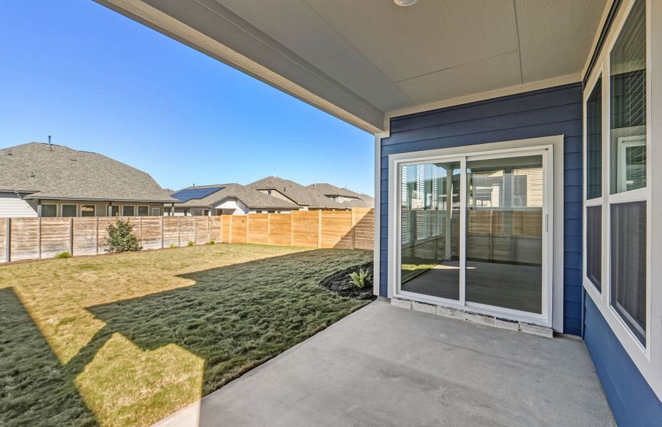 Exterior details and patio area of a home in Horizon Lake, Leander (Image 26).