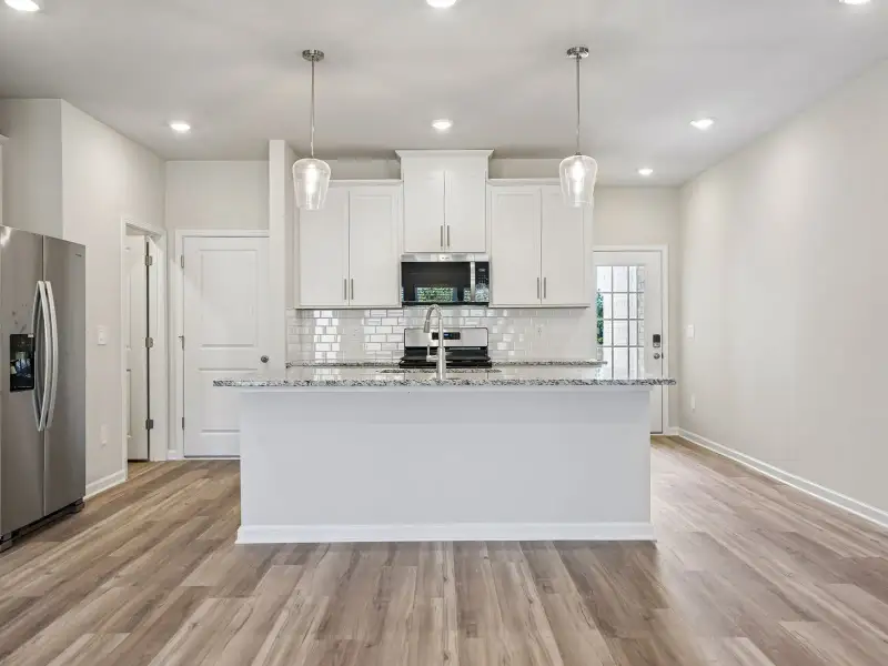 Furnished interior view inside a new home in Brooks Lake, Loganville (Image 4).