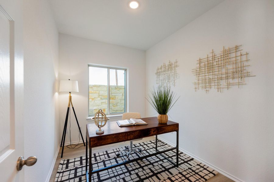 Office area featuring baseboards and recessed lighting