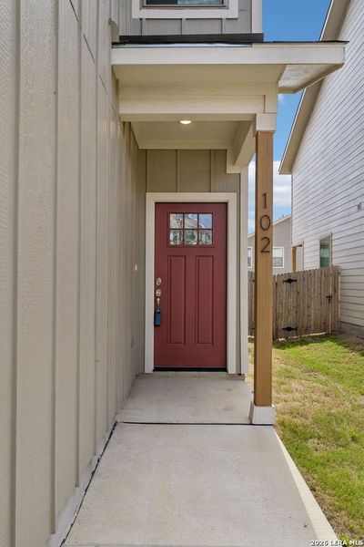 Exterior details and patio area of a home in Magnolia Village North, San Antonio (Image 3).
