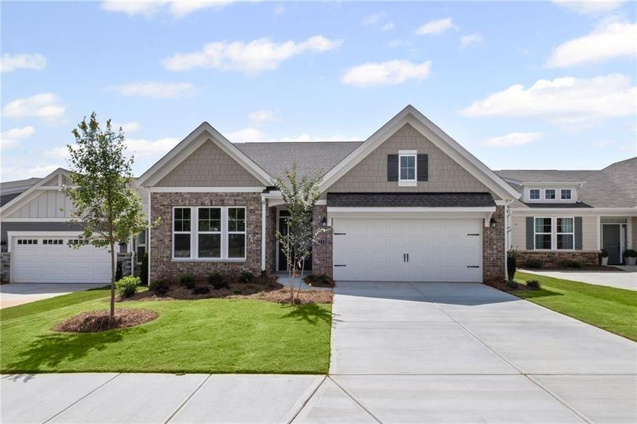 Front exterior of a new home in Laurel Farms, Dallas, GA, highlighting curb appeal (Image 22). Front exterior of a new home in Laurel Farms, Dallas, GA, highlighting curb appeal (Image 22).