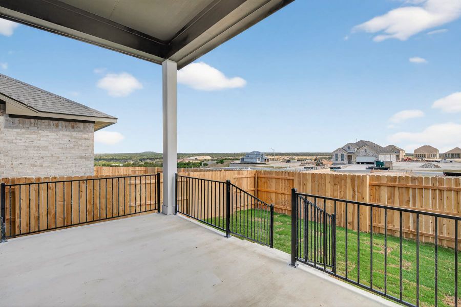 Exterior details and patio area of a home in Lariat, Liberty Hill (Image 4).