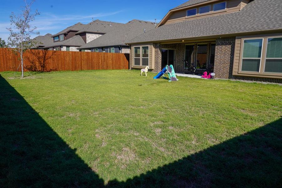 View of yard with a patio