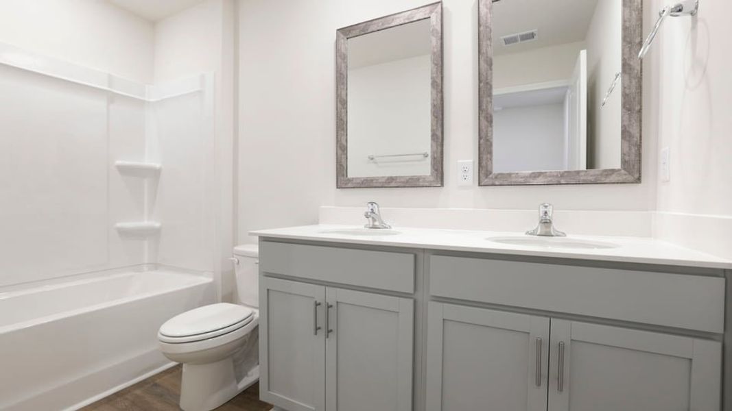 Furnished interior view inside a new home in Bentley Park, Greenwood (Image 10). Furnished interior view inside a new home in Bentley Park, Greenwood (Image 10).
