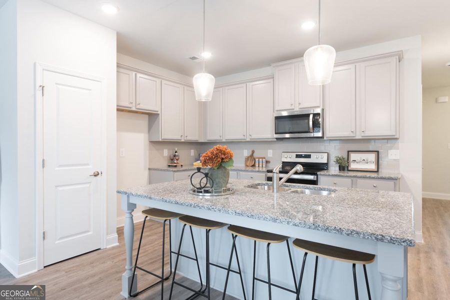 Furnished interior view inside a new home in Chimney Oaks Townhomes, Homer (Image 13). Furnished interior view inside a new home in Chimney Oaks Townhomes, Homer (Image 13).