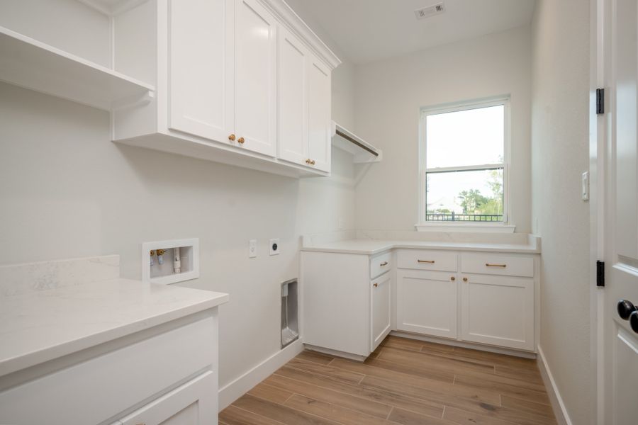 Representative furnished interior of a home built from the The Stella by Reece Homes in Traditions, Bryan (Image 17).