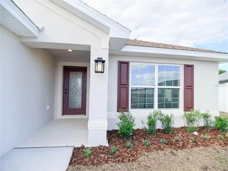 Exterior details and patio area of a home in , Ocala (Image 3).