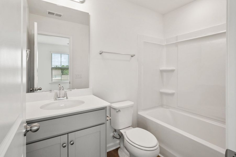 Furnished interior view inside a new home in Clear Springs Townhomes, North Charleston (Image 6).