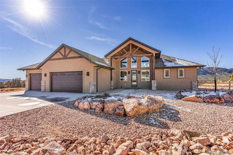 Front exterior of a new home in , Cañon City, CO, highlighting curb appeal (Image 24). Front exterior of a new home in , Cañon City, CO, highlighting curb appeal (Image 24).