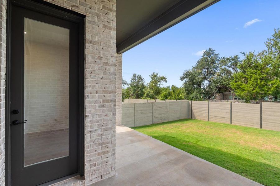 Exterior details and patio area of a home in Wolf Ranch, Georgetown (Image 22).