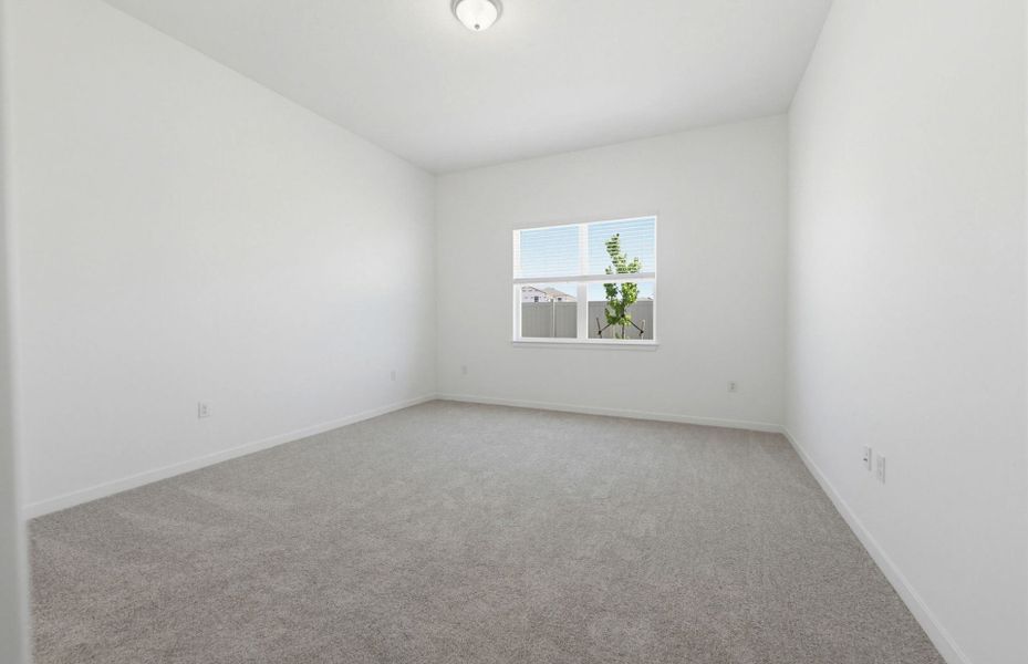 Spacious, unfurnished interior of a new home in Vida's Way, Wesley Chapel (Image 18).