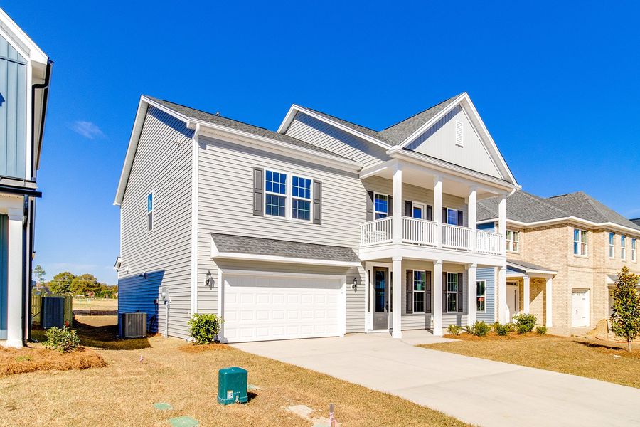 Front exterior of a new home in Hendrix Farms, Lexington, SC, highlighting curb appeal (Image 21).