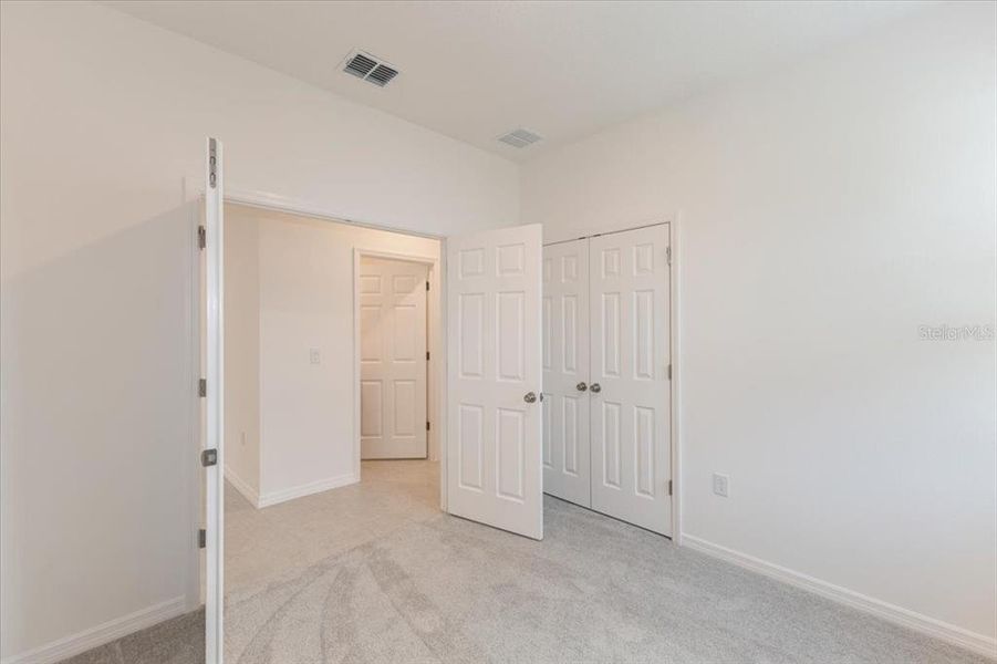 Spacious, unfurnished interior of a new home in Liberty Station, Orange City (Image 8).