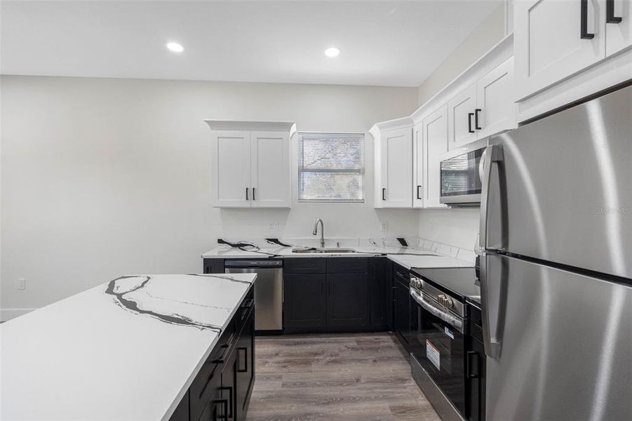 Furnished interior view inside a new home in , New Port Richey (Image 9). Furnished interior view inside a new home in , New Port Richey (Image 9).
