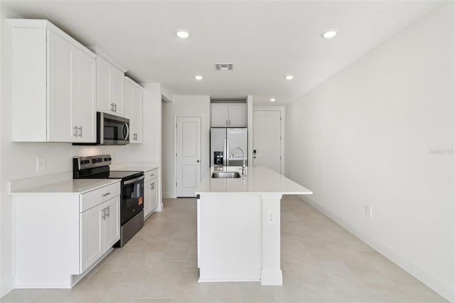 Furnished interior view inside a new home in The Reserve at Hammock Oaks - Classic Series, Lady Lake (Image 7). Furnished interior view inside a new home in The Reserve at Hammock Oaks - Classic Series, Lady Lake (Image 7).
