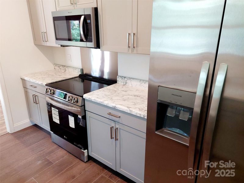 Furnished interior view inside a new home in , Hendersonville (Image 7).