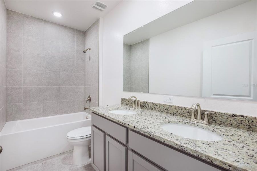 Furnished interior view inside a new home in Burnt Store Village, Punta Gorda (Image 14).