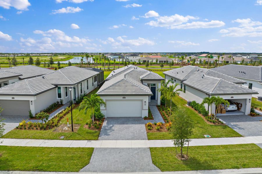 Front exterior of a new home in , Port St. Lucie, FL, highlighting curb appeal (Image 2). Front exterior of a new home in , Port St. Lucie, FL, highlighting curb appeal (Image 2).