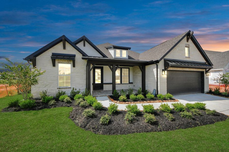 Front exterior of a new home in ARTAVIA: Hilltop Collection, Conroe, TX, highlighting curb appeal (Image 21). Front exterior of a new home in ARTAVIA: Hilltop Collection, Conroe, TX, highlighting curb appeal (Image 21).