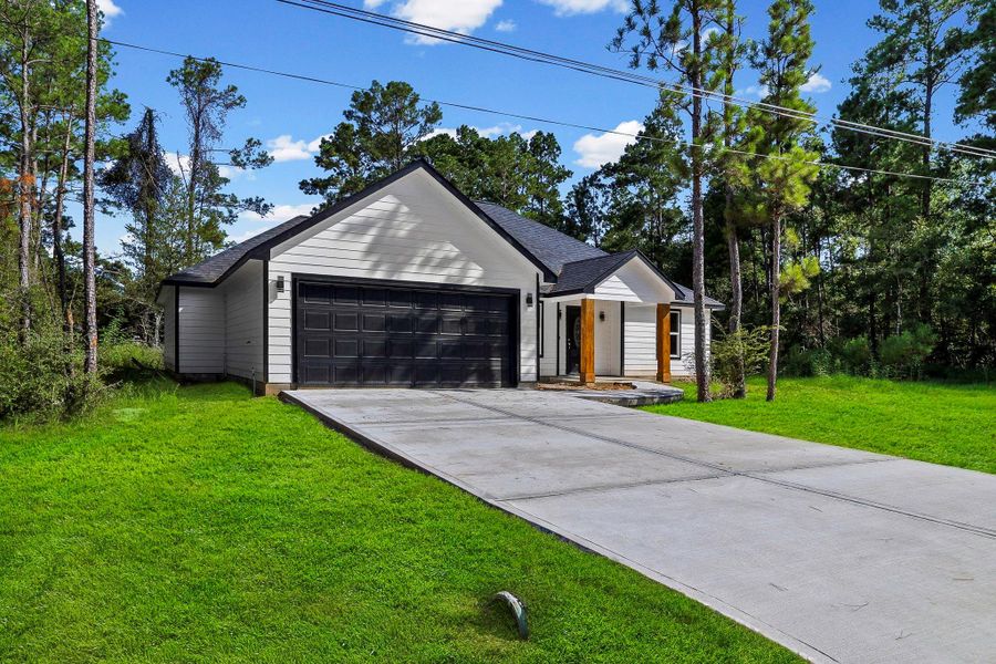 Front exterior of a new home in , Livingston, TX, highlighting curb appeal (Image 24). Front exterior of a new home in , Livingston, TX, highlighting curb appeal (Image 24).