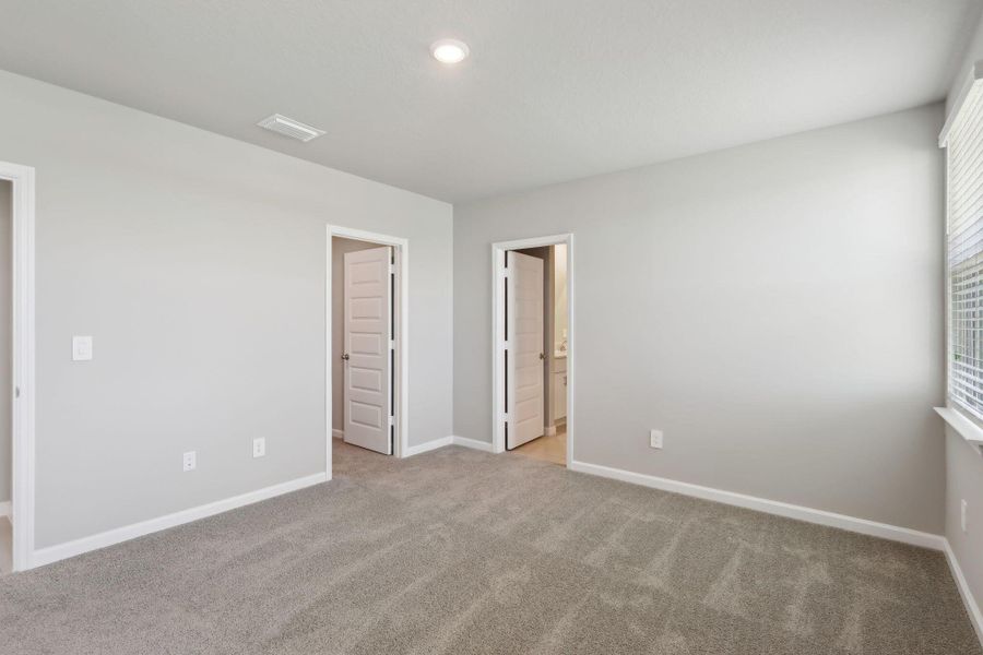 Spacious, unfurnished interior of a new home in Hampton Park - Classic Series, Vero Beach (Image 11). Spacious, unfurnished interior of a new home in Hampton Park - Classic Series, Vero Beach (Image 11).