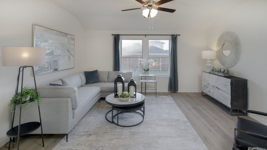 Representative furnished interior of a home built from the Ingleside by D.R. Horton in Windchime, Celina (Image 7).