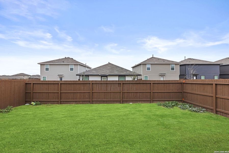 Exterior details and patio area of a home in Avenida, Converse (Image 2).