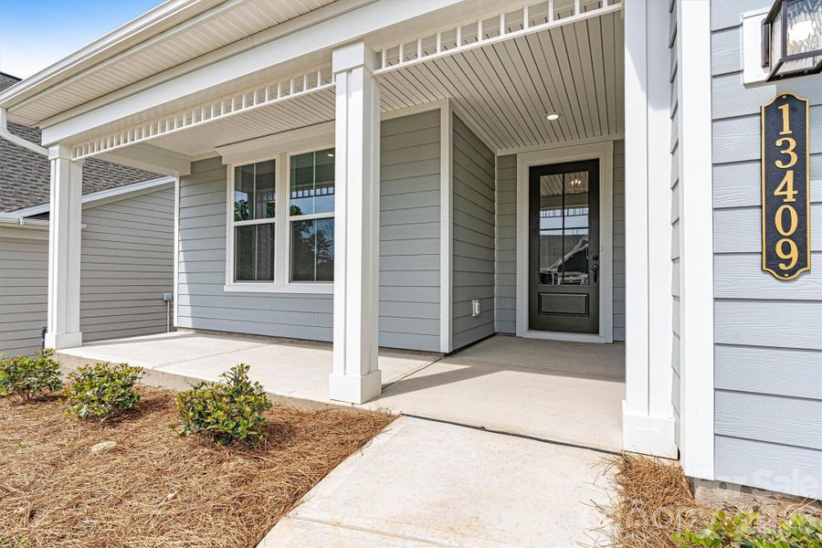 Exterior details and patio area of a home in Cresswind Charlotte, Mint Hill (Image 23). Exterior details and patio area of a home in Cresswind Charlotte, Mint Hill (Image 23).