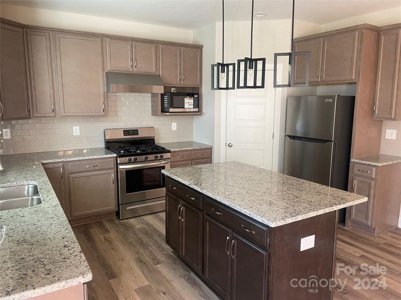 Elegant Kitchen with Island and Subway