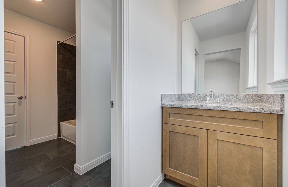 Furnished interior view inside a new home in Harmony Cove, Humble (Image 15).
