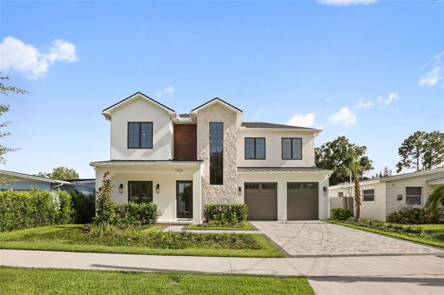 Front exterior of a new home in College Park, Orlando, FL, highlighting curb appeal (Image 1). Front exterior of a new home in College Park, Orlando, FL, highlighting curb appeal (Image 1).