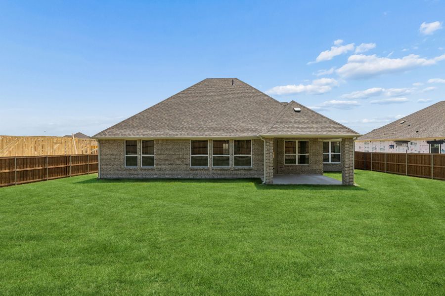 Exterior details and patio area of a home in Rainwater Crossing, Celina (Image 4). Exterior details and patio area of a home in Rainwater Crossing, Celina (Image 4).