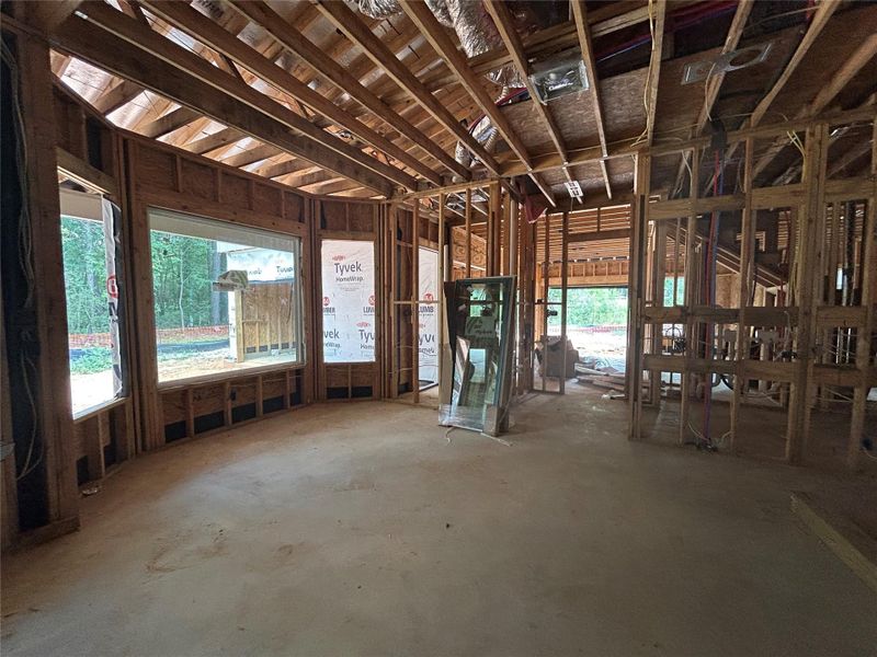 Breakfast area with large picture windows for natural lighting