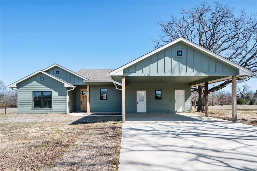 Front exterior of a new home in , Streetman, TX, highlighting curb appeal (Image 1). Front exterior of a new home in , Streetman, TX, highlighting curb appeal (Image 1).