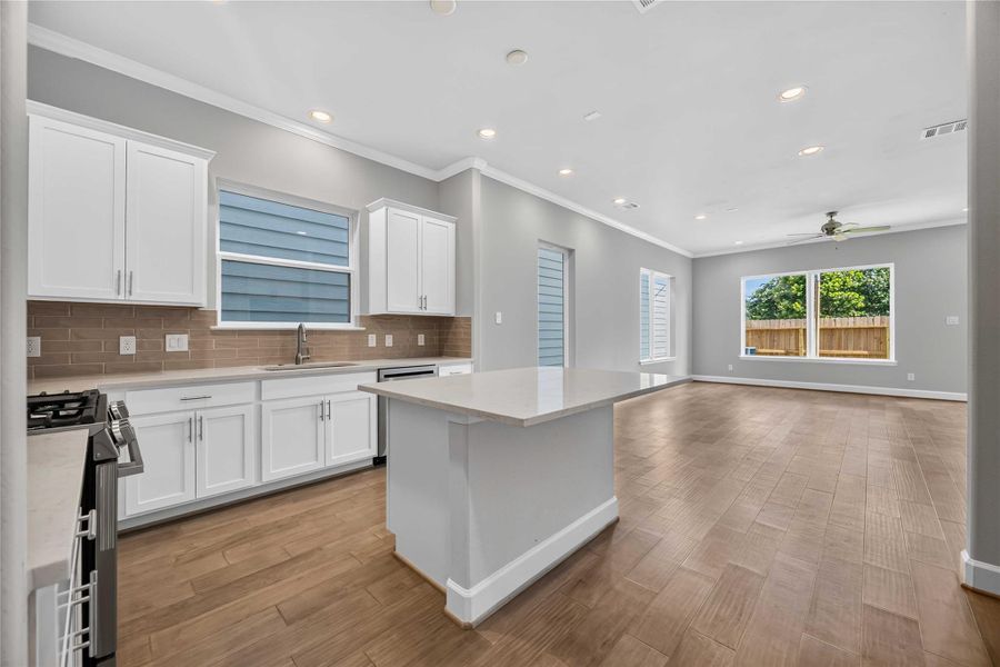Kitchen That Keeps You Connected – The island anchors an open layout where cooking, entertaining, and everyday life all happen in the same room.