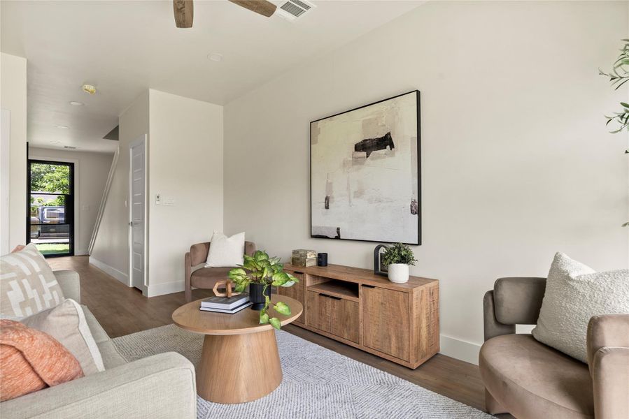 Warm wood tones and soft textures create an inviting and comfortable living space.