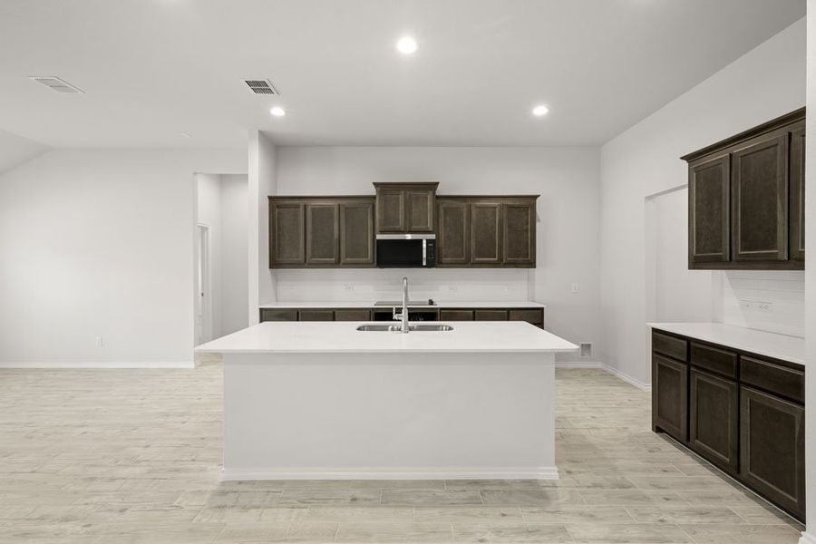 Front exterior of a new home in Mountain Valley, Burleson, TX, highlighting curb appeal (Image 10). Front exterior of a new home in Mountain Valley, Burleson, TX, highlighting curb appeal (Image 10).